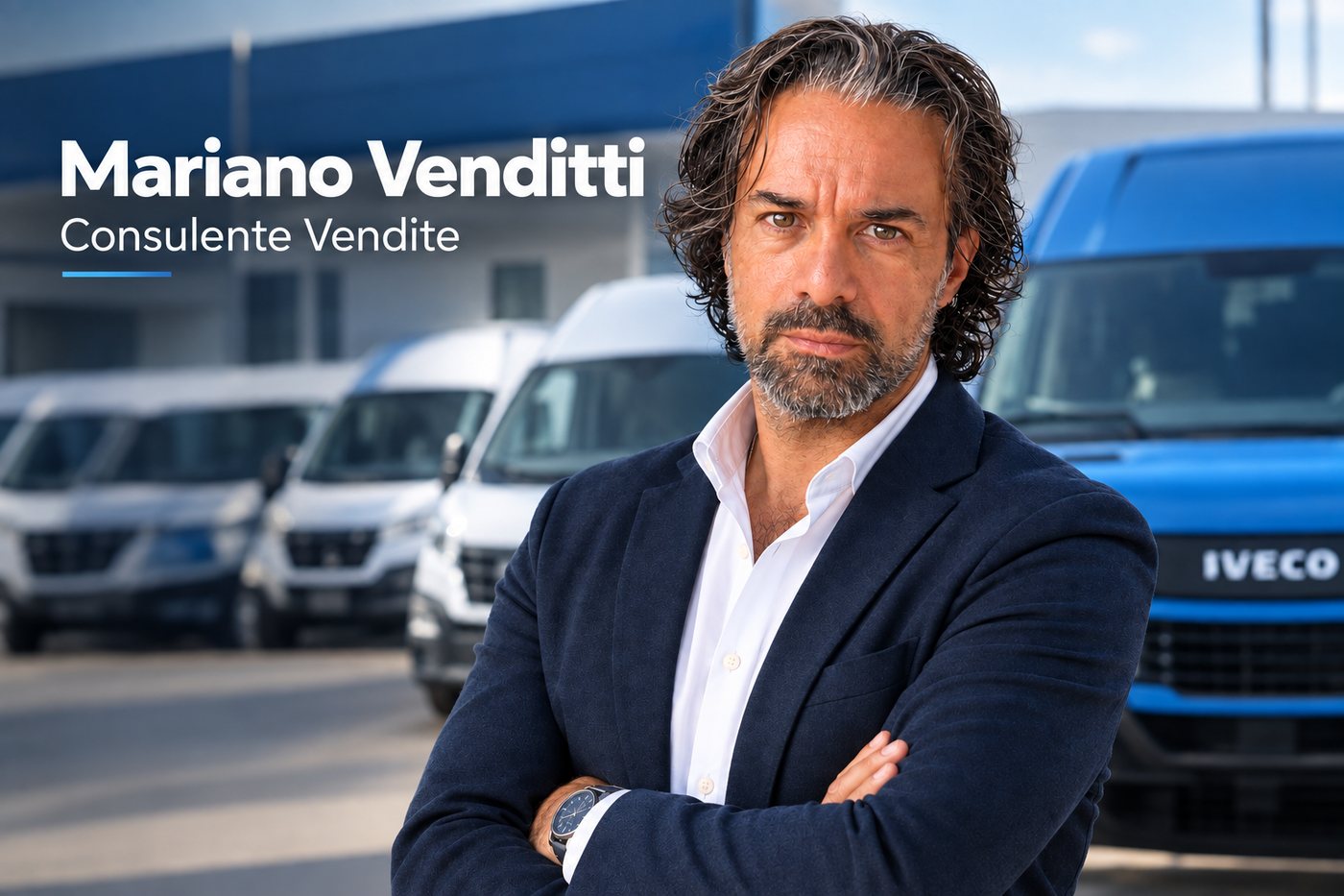 Mariano Venditti, consulente vendite, davanti a una fila di furgoni IVECO